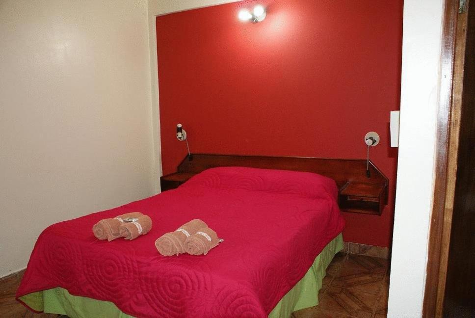 Residencial Noelia Hostel פוארטו איגואסו חדר תמונה